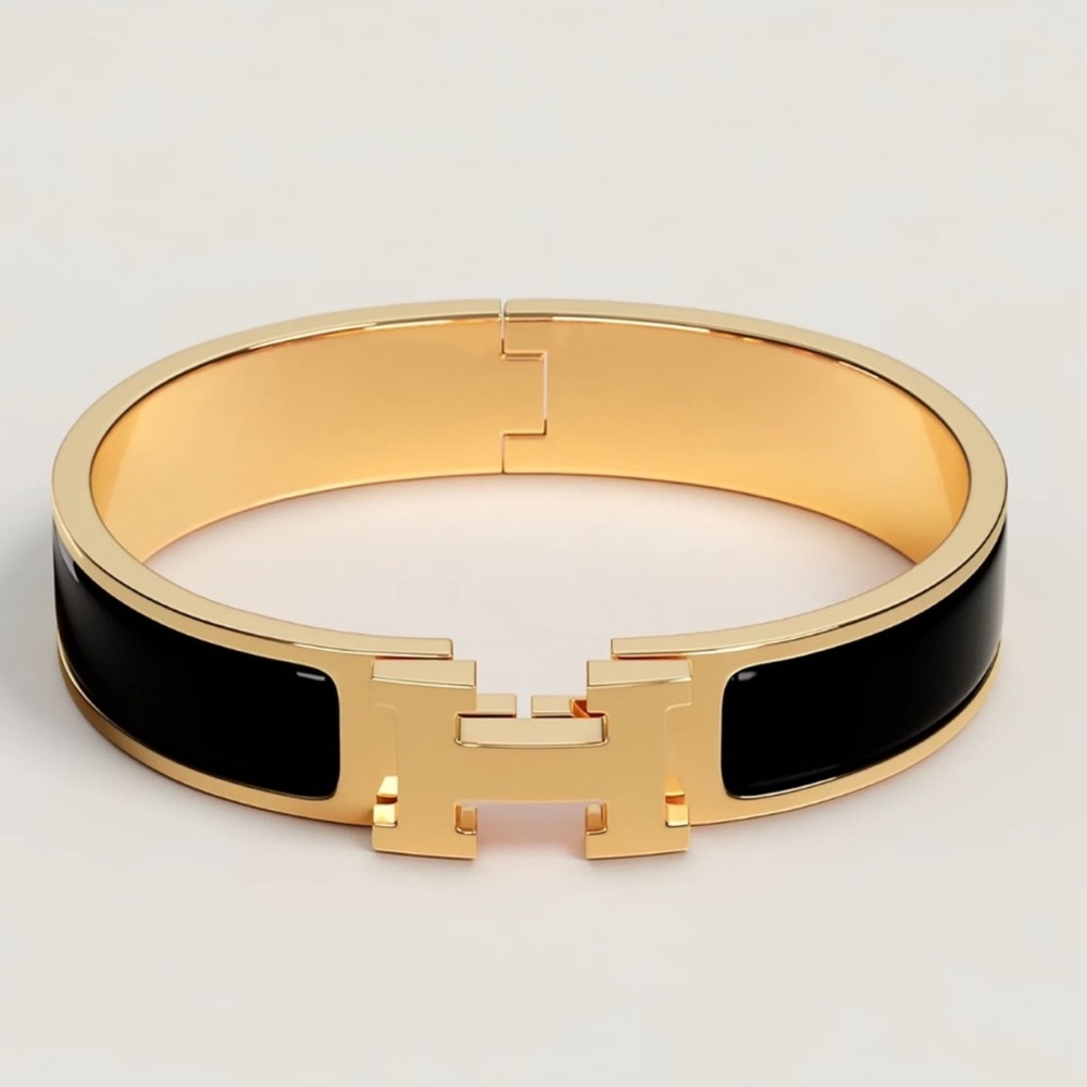 Hermes small black and gold Clic H bracelet - Picture 1 of 6